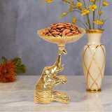 Golden metal elephant dry fruit bowl showpiece holding almonds