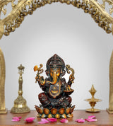 Lord Ganesha brass idol seated, holding utensils, on lotus base; 5 inch
