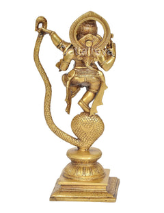 Brass Ganesha dancing idol front view, serpent tail coiled around pedestal