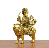 Durga Maa brass idol close-up on lion, ornate crown and multiple arms holding items