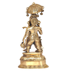 Brass Ganesha showpiece holding umbrella, back/side view with engraved pedestal