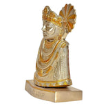 Brass Khatushyam idol figurine, side profile with ornate crown and gold-patterned robe