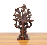 Brass Dakshinamurti Shiva murti rear view, carved flowing motifs and base