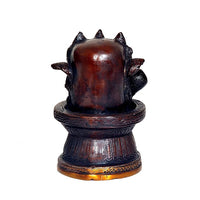 Brass Shiva linga statue back view with three heads and smooth linga