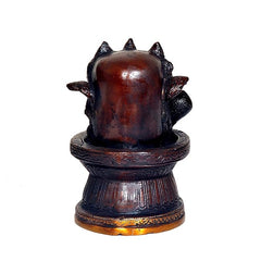 Brass Shiva linga statue back view with three heads and smooth linga