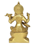 Brass Saraswati statue back view, carved headdress and seated veena pose