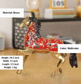 Brass running horse showpiece (10.5 in), multicolor floral detailing on red body