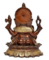 Back view of brown brass Ganesha sculpture with ornate halo and seated base