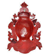 Resin wall hanging mask back, red embossed deity figure with hanging loop