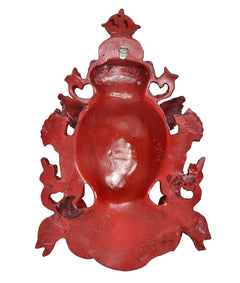 Resin wall hanging mask back, red embossed deity figure with hanging loop