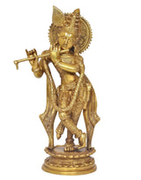 Brass Krishna idol statue with flute, detailed jewelry and draped sash, on base