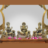 Brass idol trio of Ganesha, Lakshmi, Saraswati on singhasan, 4-inch height