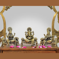 Brass idol trio of Ganesha, Lakshmi, Saraswati on singhasan, 4-inch height