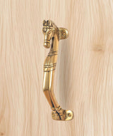 Brass horse-shaped door handle with curved lever and round fixing points