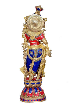 Radha-Krishna brass Murti back view, crown and spiral halo visible, blue-red accents