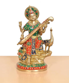 Saraswati statue with green and red sari, gold-toned brass body, seated with veena