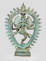 Bronze Shiva Nataraj back view, dancing legs and arms, spiked halo arch, blue-green patina