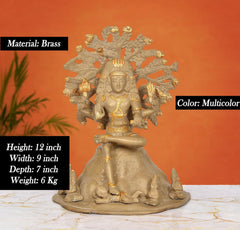 Brass Dakshinamurti Shiva statue with multicolor accents, seated figure, 12-inch