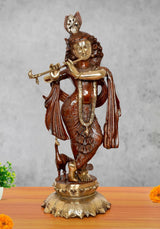 Krishna brass idol playing flute, detailed draped robe, on round pedestal