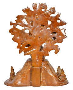 Brass Dakshinamurti Shiva statue rear view, ornate back halo and seated base