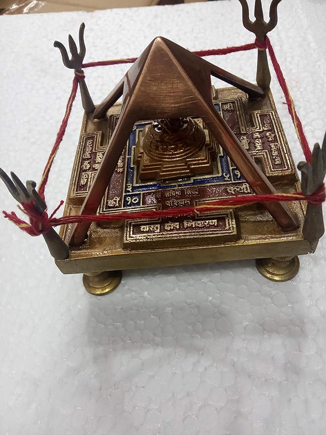 Brass Vastu Dosh Nivaran pyramid with base and red tying cords, 3.5 in height