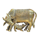 Brass Kamdhenu cow with calf figurine, detailed saddle pattern, front view
