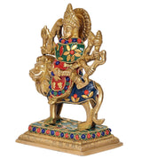 Brass Durga Maa statue riding lion, detailed arms and ornaments with jeweled colors