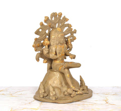 Brass Dakshinamurti Shiva statue, seated with one hand raised and sculpted base