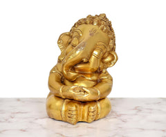 Brass Bal Ganesha murti, front view, seated posture with ornate crown and ornaments