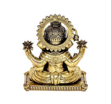 Brass Ganesha statue idol rear view, engraved halo and seated pedestal