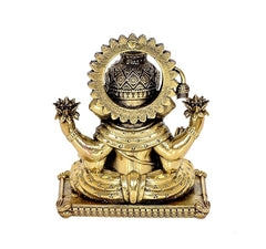 Brass Ganesha statue idol rear view, engraved halo and seated pedestal