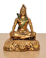 Lord Shiva seated resin statue with detailed face, crown hair, and green-and-gold necklace.