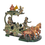 Brass chariot statue with Krishna on platform, Arjuna rider, and horse team.
