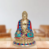 Seated Buddha statue in brass with multicolored robe and lotus base
