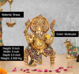 Brass Ganesha statue, multicolor meenakari work on seated figure and base, 8 inch