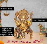 Brass Ganesha statue, multicolor meenakari work on seated figure and base, 8 inch