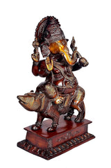 Brass Ganesha on mouse statue, maroon base with carved border details