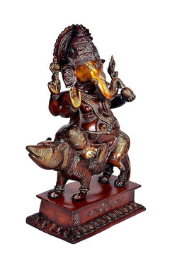 Brass Ganesha on mouse statue, maroon base with carved border details