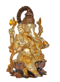 Ganesha brass idol front-left view, seated on lotus with carved halo and trunk