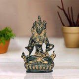 Tara Devi brass goddess idol, seated four-armed pose, dark green and gold finish