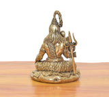 Brass Lord Shiva statue back view, seated beaded robe, trident beside, 5.5 in