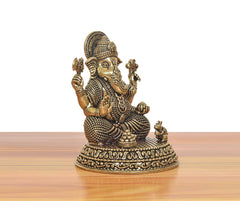Superfine Brass Ganesh statue, three-quarter view with patterned base and ornaments