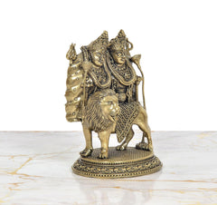 Kaila Devi Chamunda brass statue on lion murti base, back view