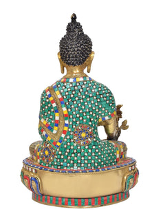 Back view of brass meditating Buddha statue, teal jeweled robe panels, textured crown