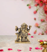 Brass Shree Kal Bhairava idol with raised arms, seated pooja statue on pedestal