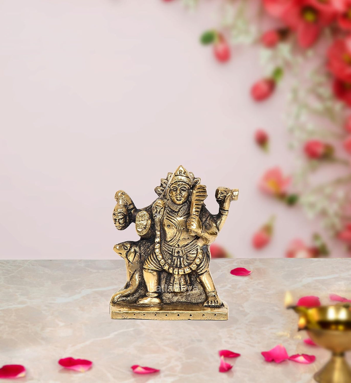 Brass Shree Kal Bhairava idol with raised arms, seated pooja statue on pedestal