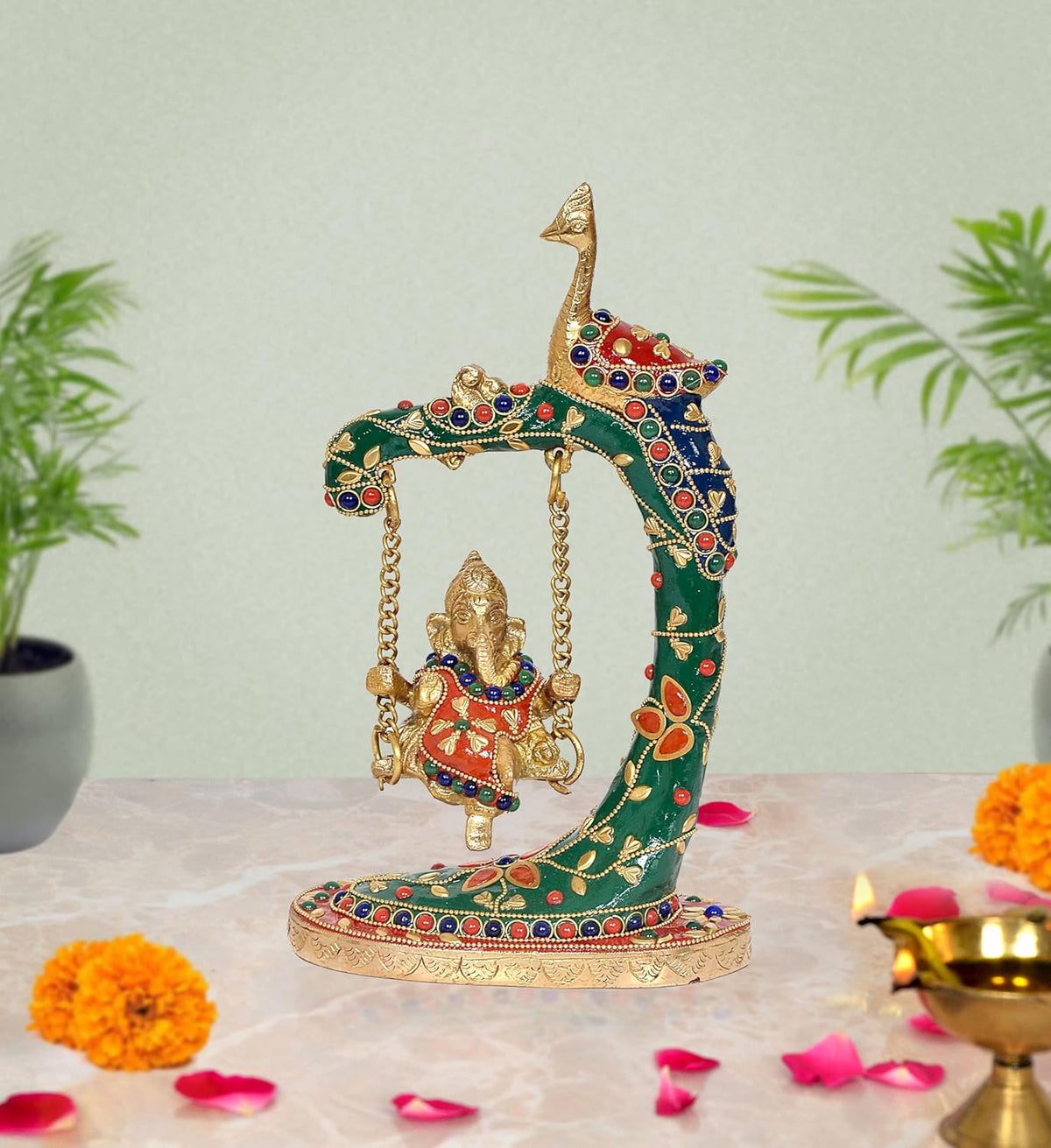 Brass Ganesha on peacock swing statue with multicolor enamel accents and gold base