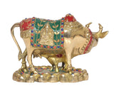 Brass cow and calf pooja mandir showpiece, colorful border detailing on saddle cloth