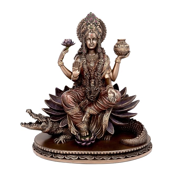Bronze Maa Ganga on crocodile base, seated on lotus with water pot and raised hand