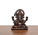 Sitting Ganesha brass idol, front view, detailed face and jeweled headpiece
